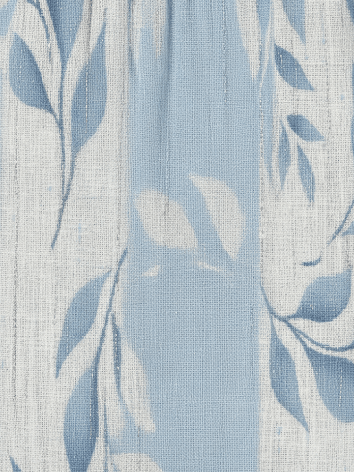 Blue leaf pattern Solene™ midi dress by Emma & Rose Cape Town, sleeveless with a flowing, elegant design.