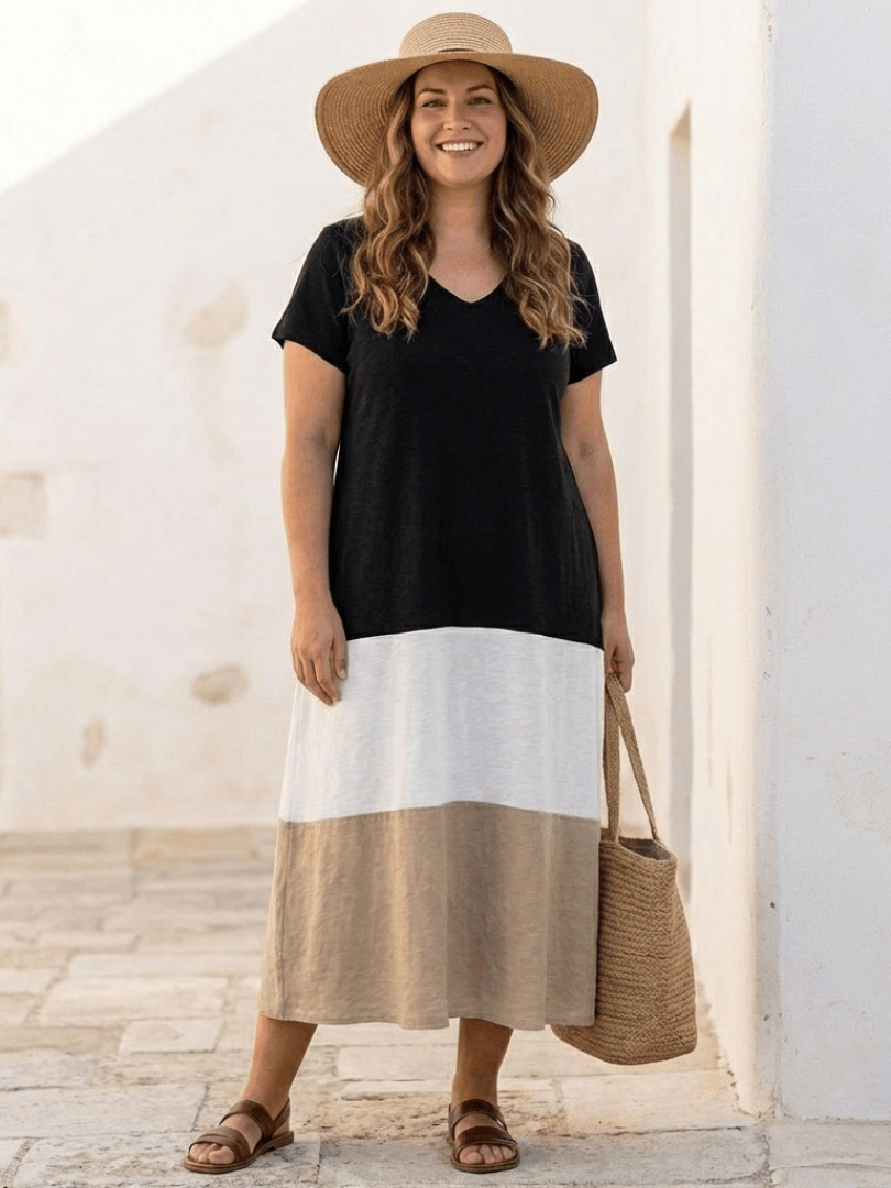 Emma & Rose Cape Town Thalia V-neck midi dress featuring short sleeves and color block design, displayed on a hanger.