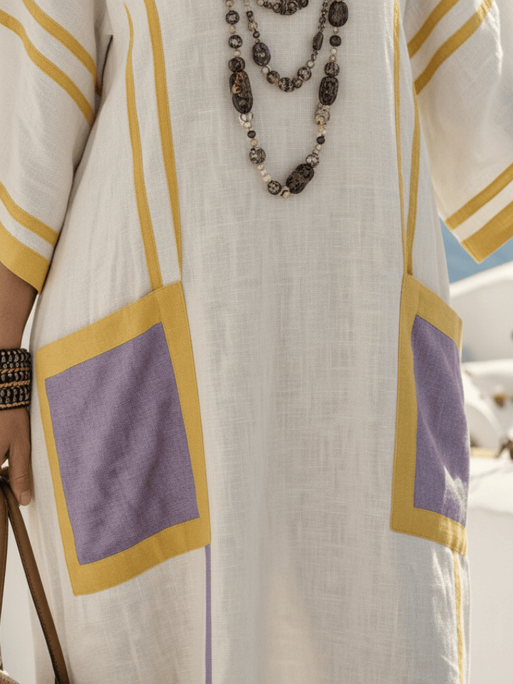 Emma & Rose Cape Town Zafira™ Sleeve Pocket Maxi Dress in airy fabric with a relaxed fit and stylish pocket details.