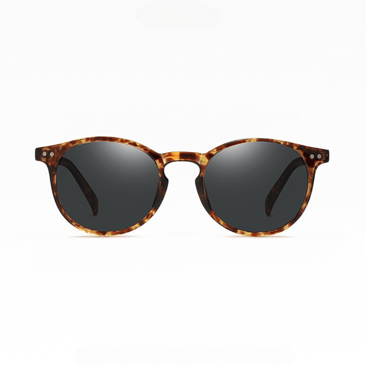 Emma & Rose Manhattan Zelda™ polarized sunglasses with dark tinted lenses and sleek black frames.