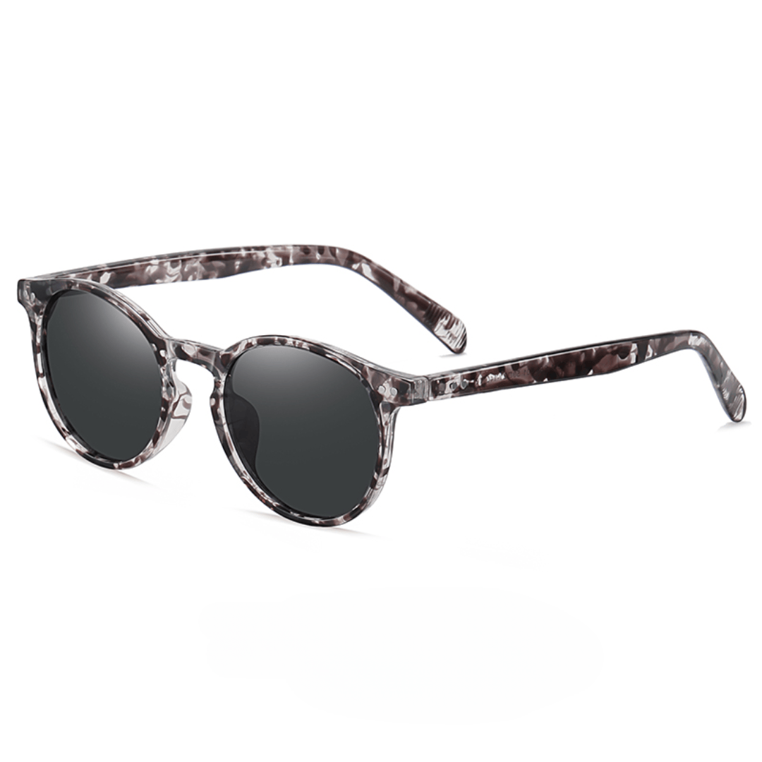 Emma & Rose Manhattan Zelda™ polarized sunglasses with sleek black frames and tinted lenses for stylish eye protection.