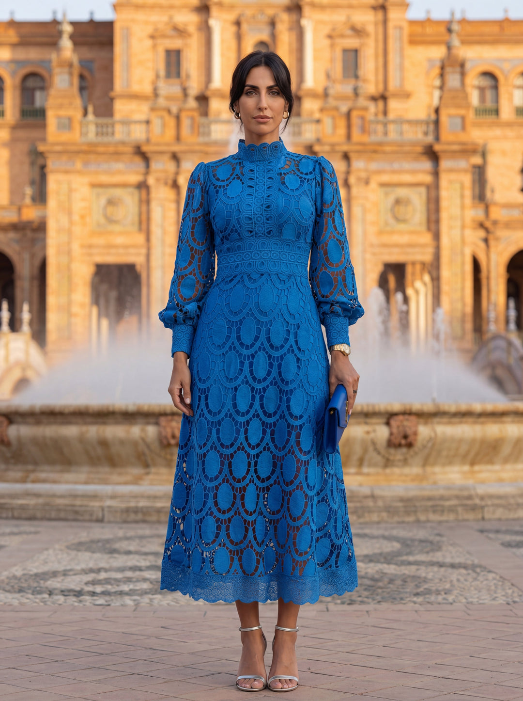 Spring lace dress by Emma & Rose Cape Town featuring floral embroidery and a flowing design.