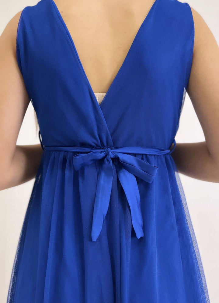 Karina™ Ariel dress by Emma & Rose Cape Town, stylish abiti with elegant design and vibrant fabric, displayed on a hanger.