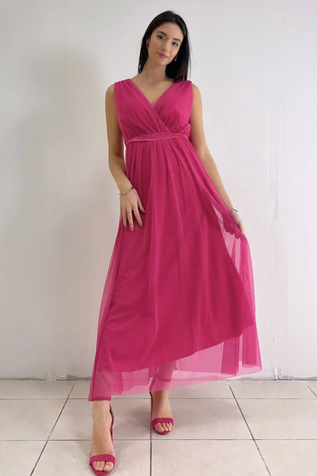 Karina Ariel dress by Emma & Rose Cape Town, elegant abiti with flowing fabric and floral details, perfect for special occasions.