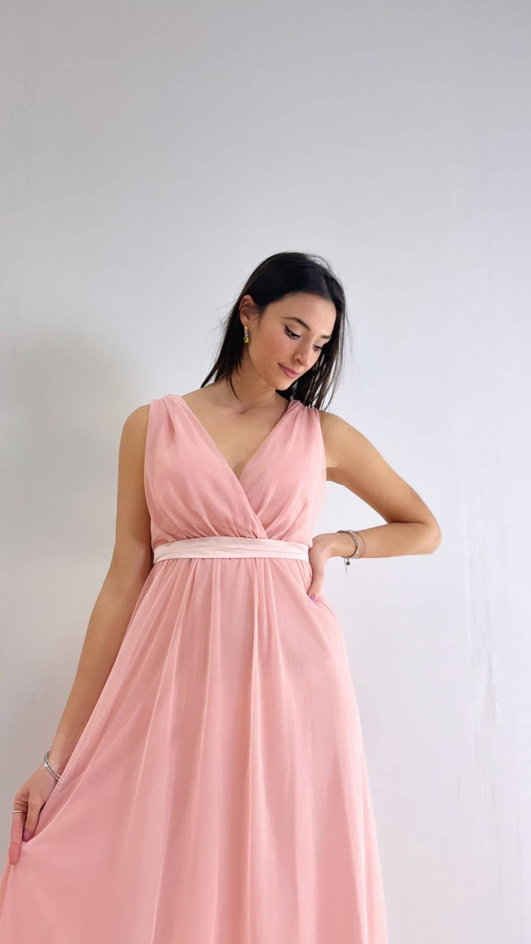 Karina™ Ariel Dress by Emma & Rose Cape Town, elegant abiti with flowing fabric and intricate detailing, displayed on a mannequin.
