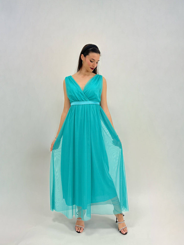 Karina™ Ariel dress by Emma & Rose Cape Town, elegant abiti with flowing fabric and stylish design, displayed on a mannequin.