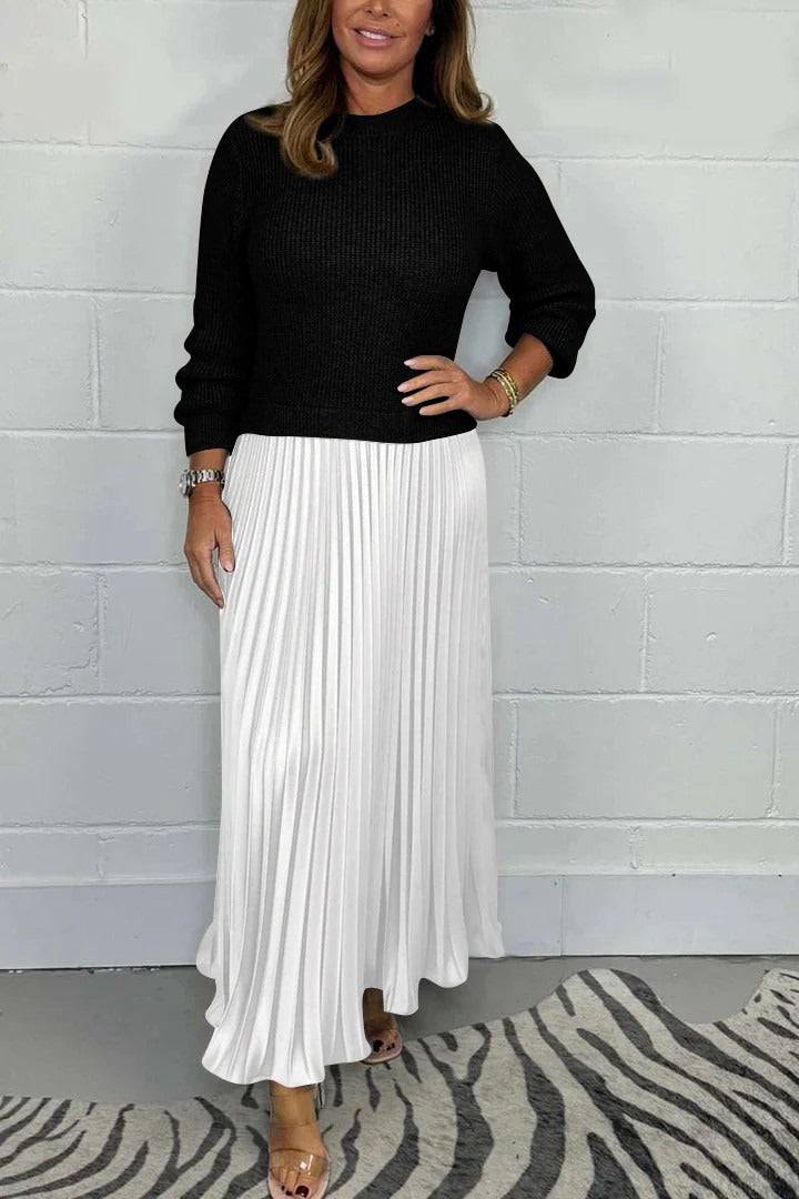 Elegant Maeliq™ Maxi Dress by Emma & Rose Cape Town, shown in a flowing fabric with a fitted waist and stylish neckline.