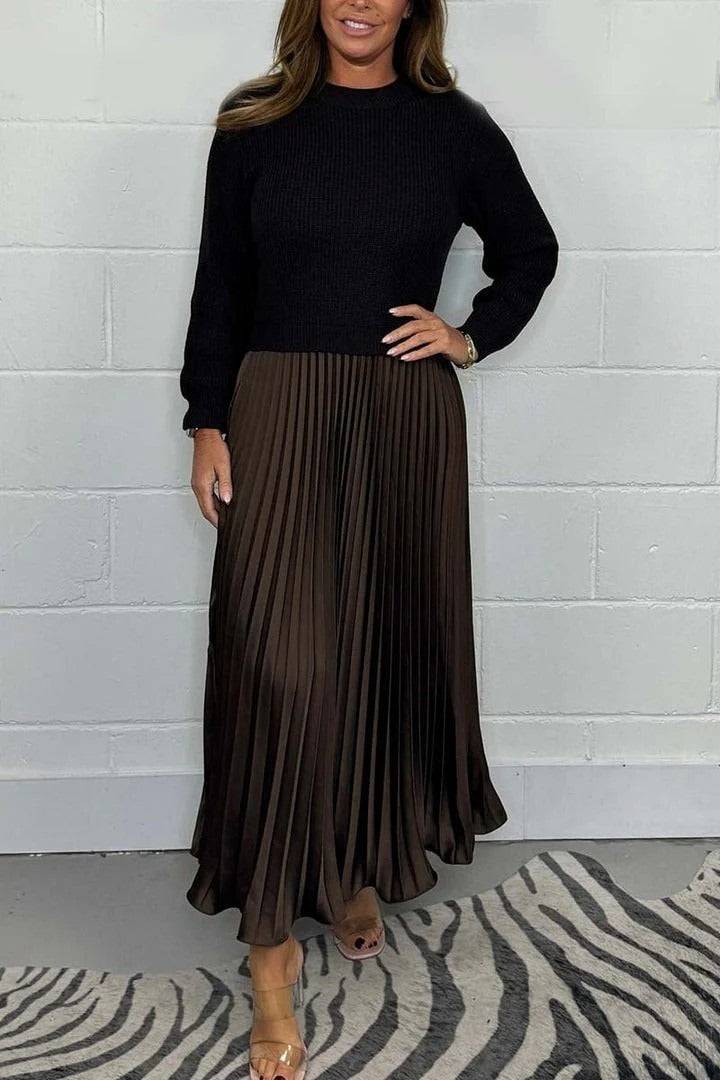 Elegant Maeliq™ maxi dress by Emma & Rose Cape Town, featuring flowing fabric and intricate detailing, shown on a model.