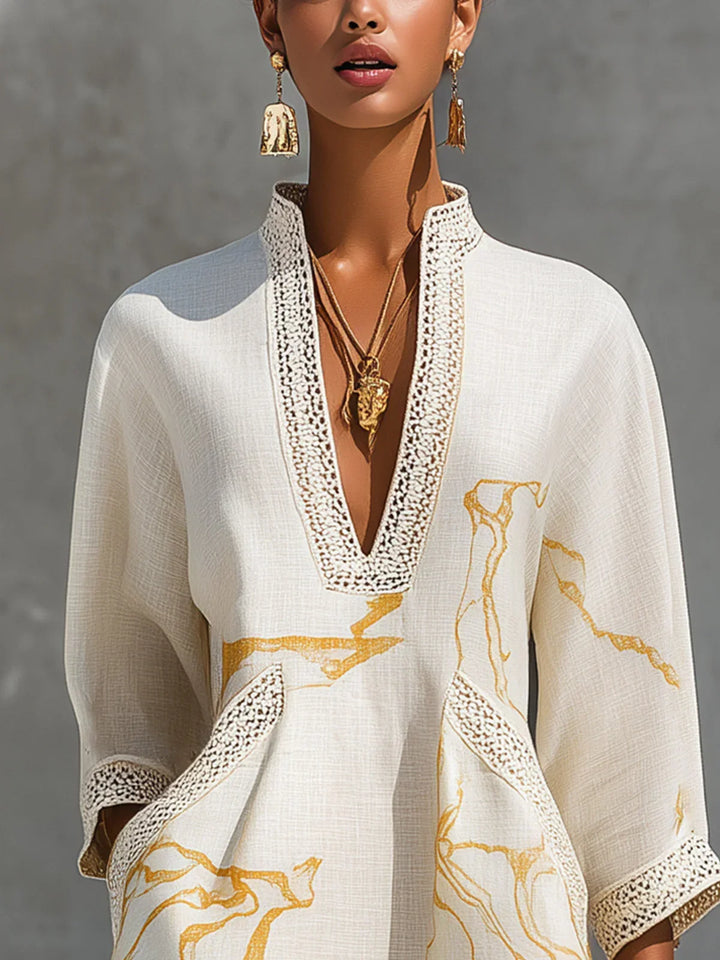 Renata - Short lace dress with gold print and deep V-neck