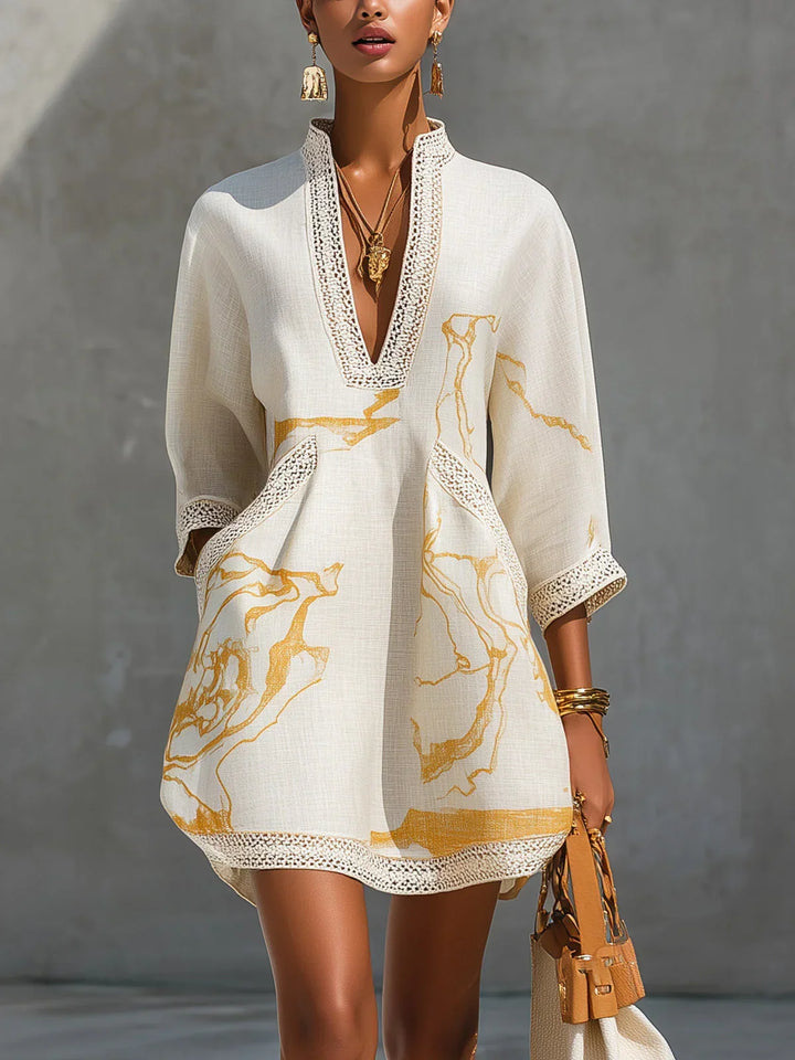 Donatella - Black mini dress with golden marble print and crochet lace