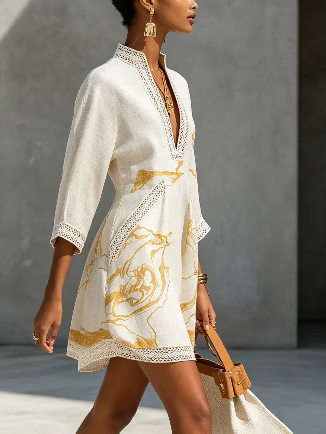 Renata - Short lace dress with gold print and deep V-neck