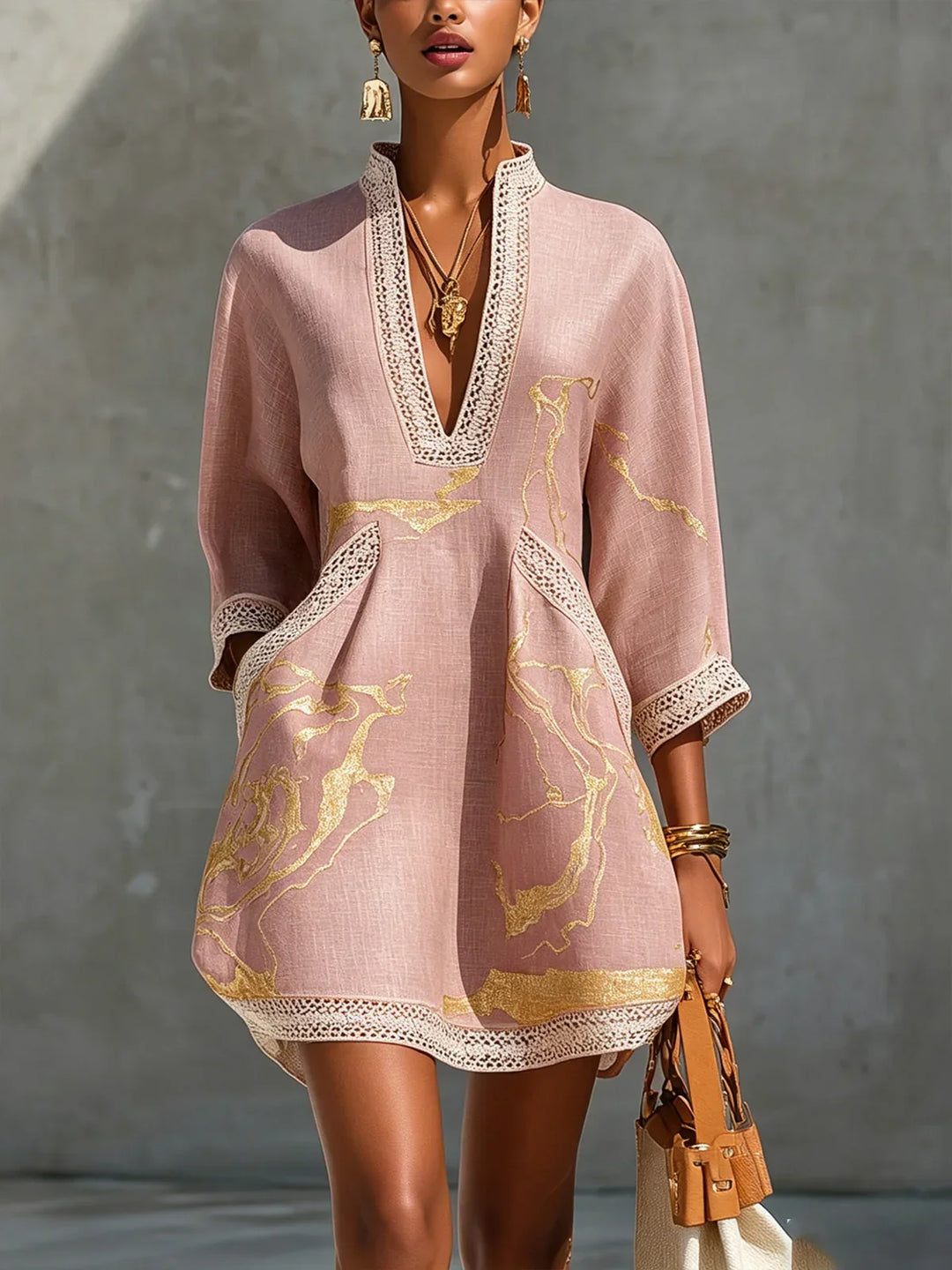 Renata - Short lace dress with gold print and deep V-neck