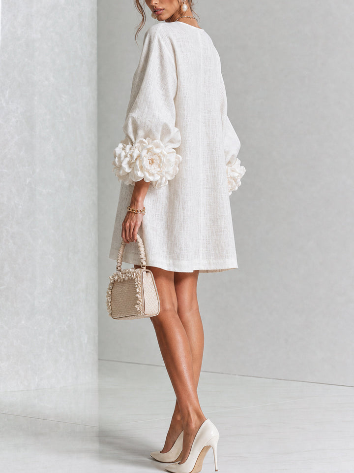 White Mini Dress with Floral Buttons and Extravagant Floral Sleeves