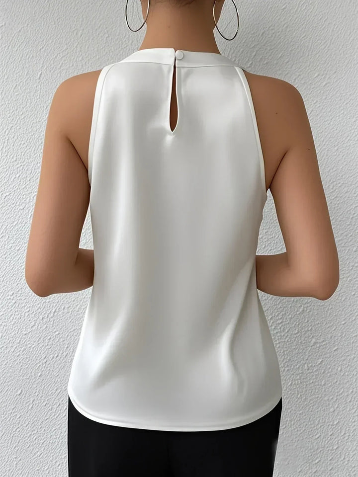 VANESSA – LUXE TWIST HALTER TOP