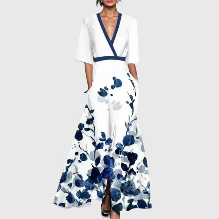 Elegant spring dress by Emma & Rose Cape Town featuring a flowy design and floral pattern, perfect for warm-weather occasions.