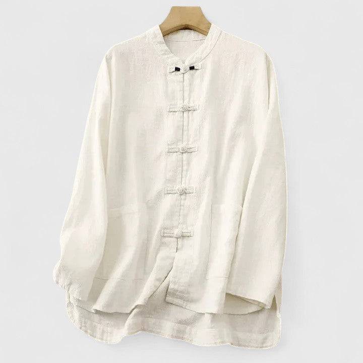 Cassiopeia™ comfortable shirt by Emma & Rose Cape Town, featuring soft fabric and a relaxed fit, displayed on a hanger.