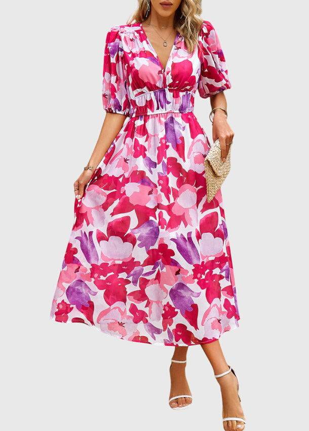 Emma & Rose Cape Town Merlin™ Estella floral midi dress with flattering silhouette and vibrant floral pattern.