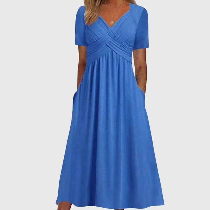 Amanda™ flattering dress by Emma & Rose Cape Town, shown in a stylish silhouette with elegant fabric and design details.