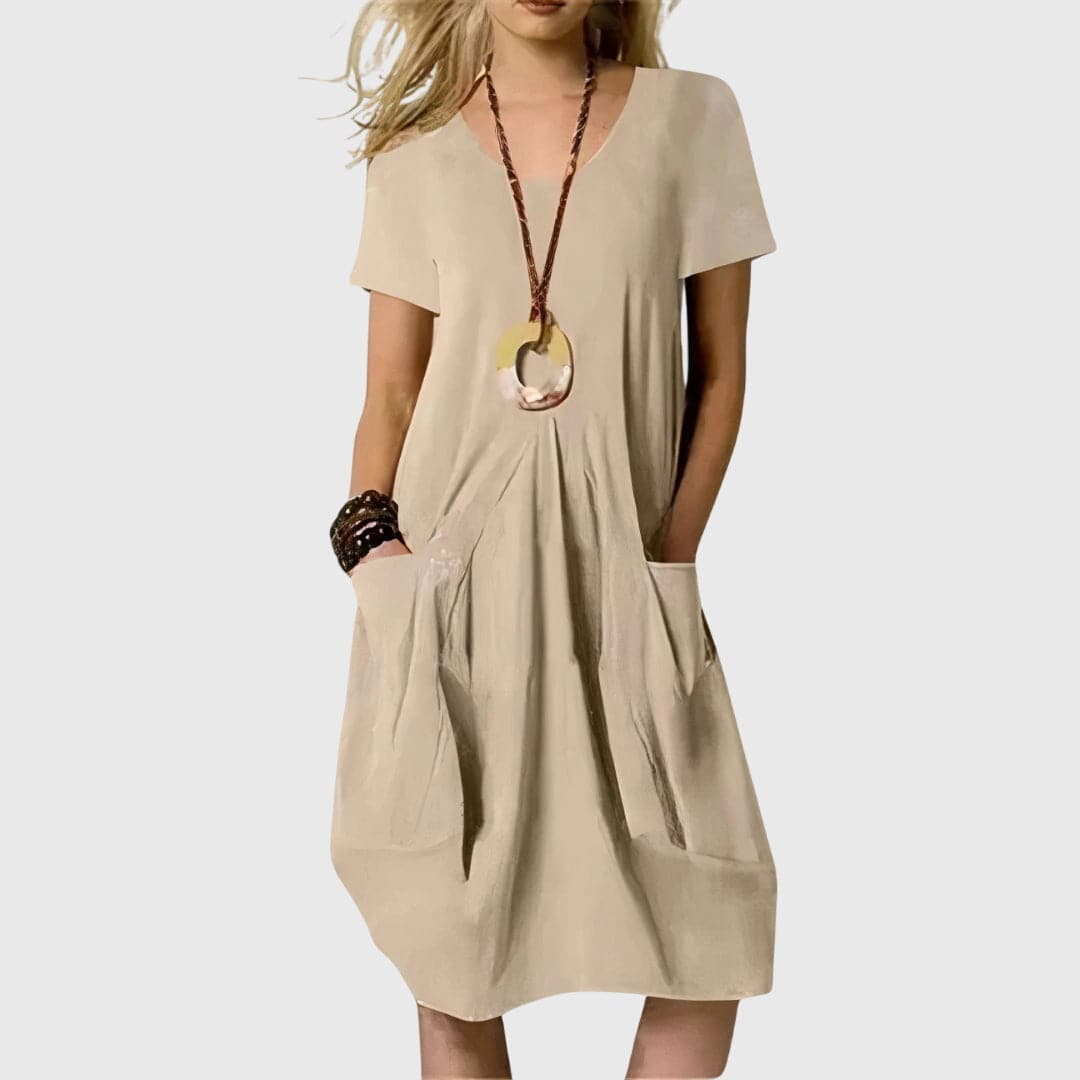 Naomi™ casual dress by Emma & Rose Cape Town, stylish and comfortable, featuring a relaxed fit and soft fabric in natural tones.