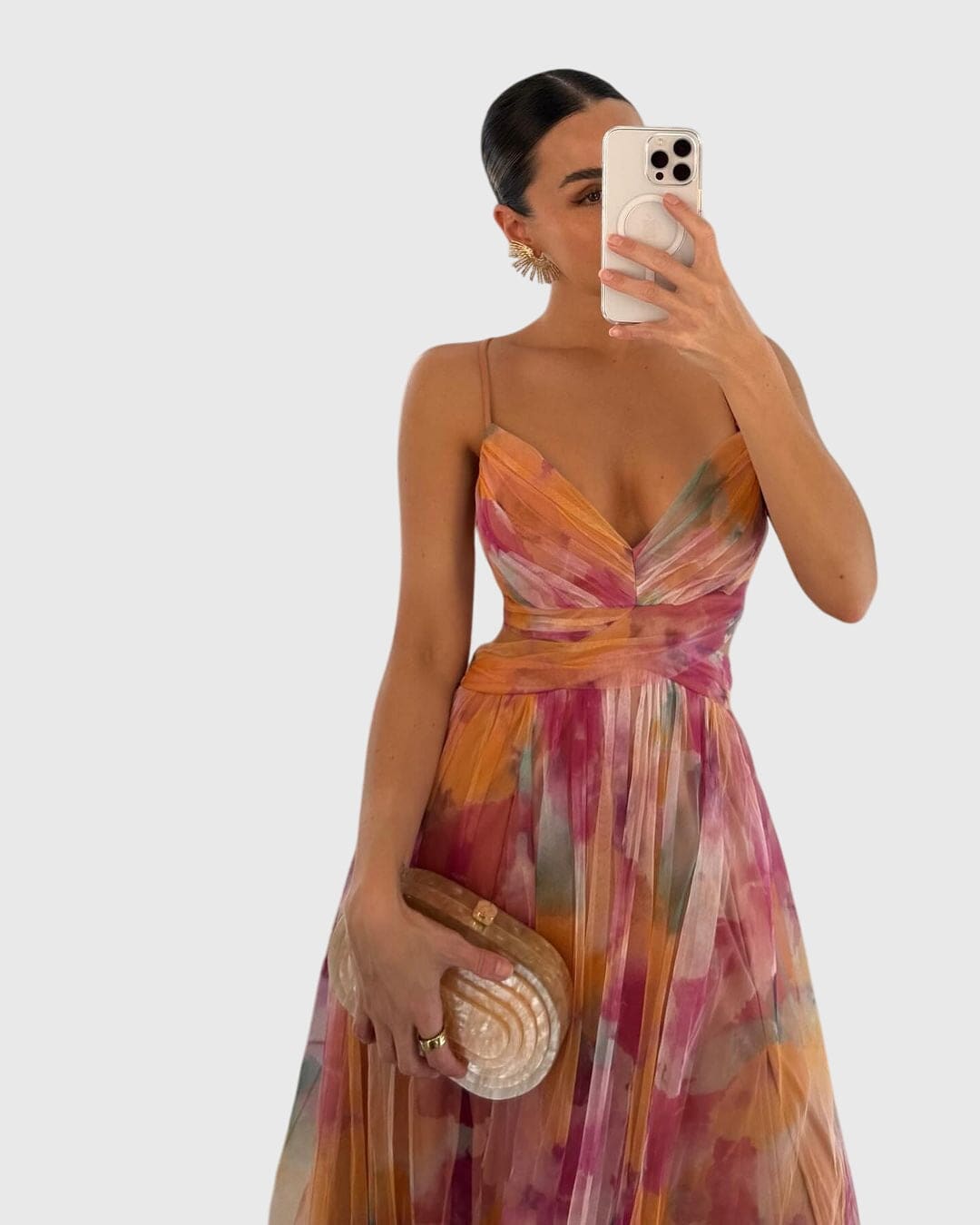 Giselle™ floral maxi dress by Emma & Rose Cape Town featuring a flowing fabric and vibrant floral pattern.