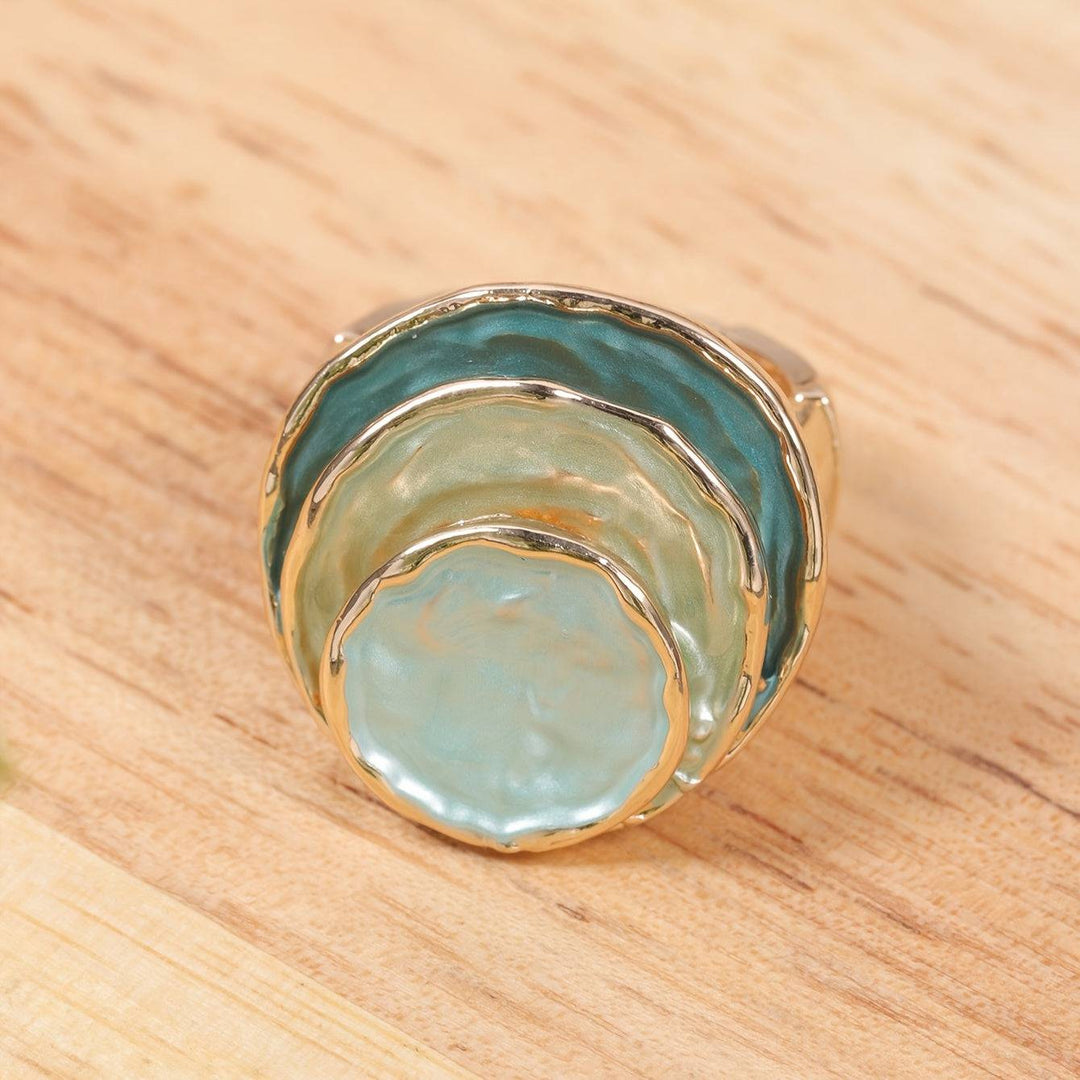 Emma & Rose Cape Town Shana™ boho triple layer ring with intricate design and mixed metal finish, layered on a neutral background.