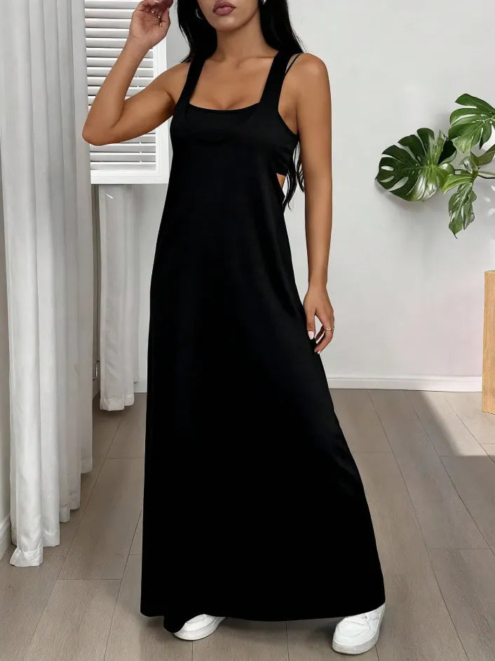 Long women's dress with a two-piece effect and side cutouts