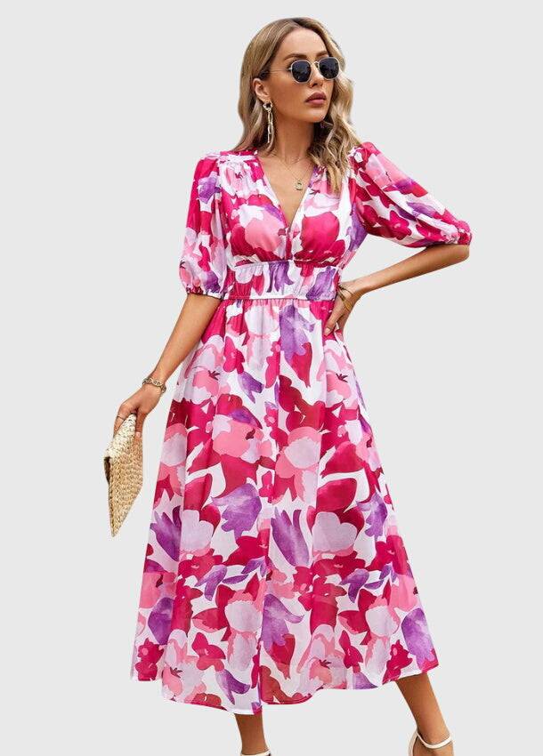 Emma & Rose Cape Town Merlin™ Estella floral midi dress with flattering silhouette, featuring vibrant floral patterns and elegant design.