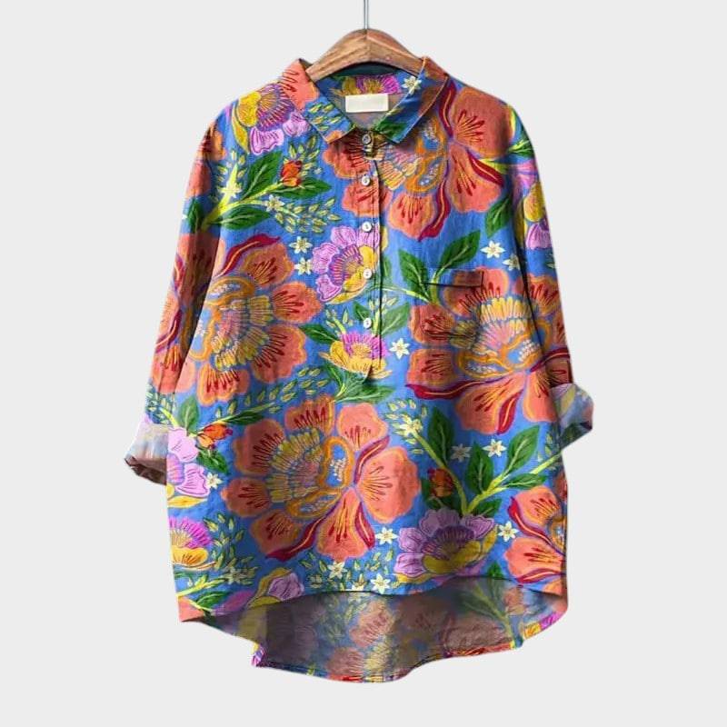 Elegant Mira™ blouse by Emma & Rose Cape Town, shown in a stylish, flowing fabric with a tailored fit and subtle detailing.