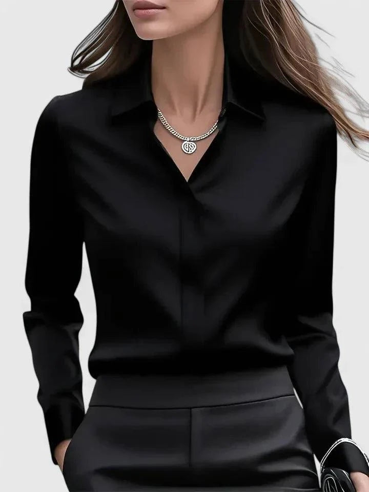 Elegant Melvaya™ top by Emma & Rose Cape Town, featuring a stylish design and smooth fabric, shown in a close-up image.