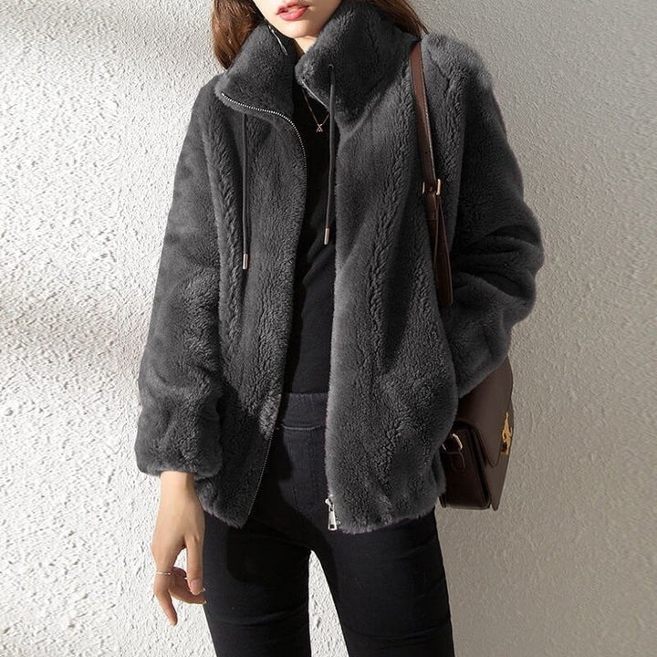 Reversible quilted fleece jacket with high collar – Warm and comfortable