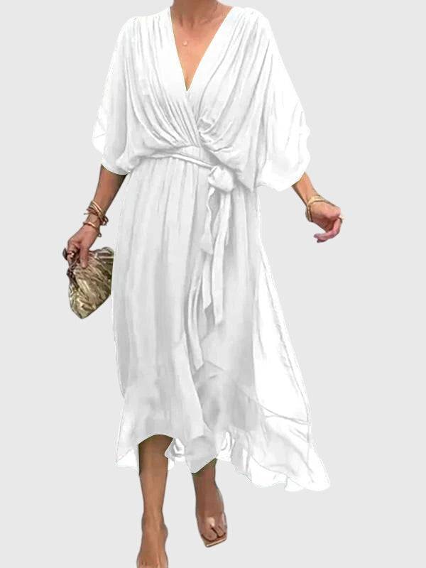 Elegant Bethany™ dress by Emma & Rose Cape Town featuring a stylish, flowing design and intricate details in a light fabric.