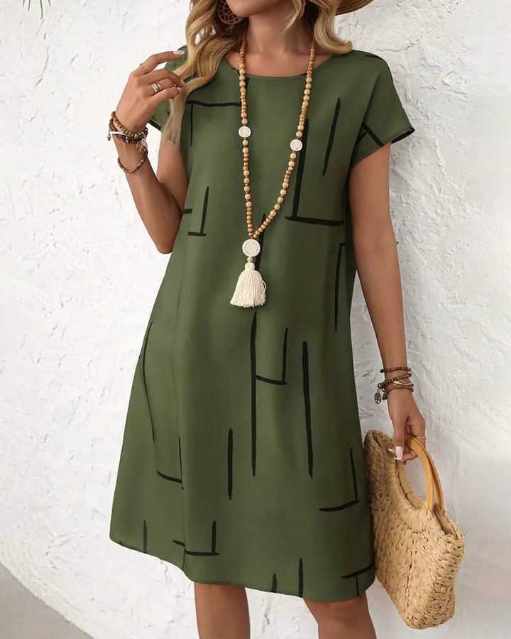 Soline™ | Tummy Concealing Dress with Line Print