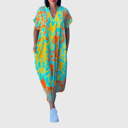 Elegant summer dress by Emma & Rose Cape Town featuring a flowy fabric and stylish design, perfect for warm weather.