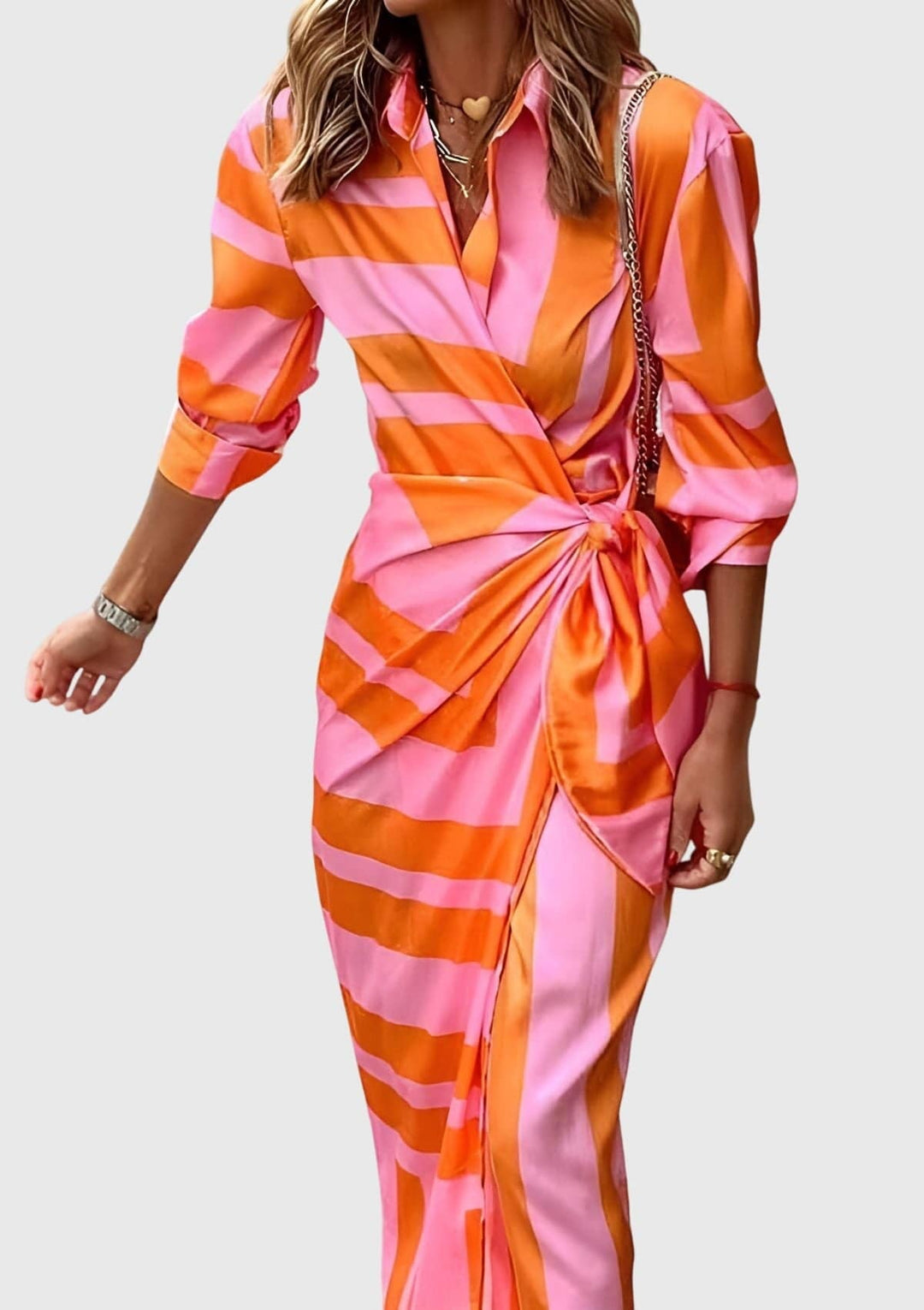 Everly™ elegant wrap dress by Emma & Rose Cape Town with a stylish print, featuring a flattering wrap design and vibrant pattern.
