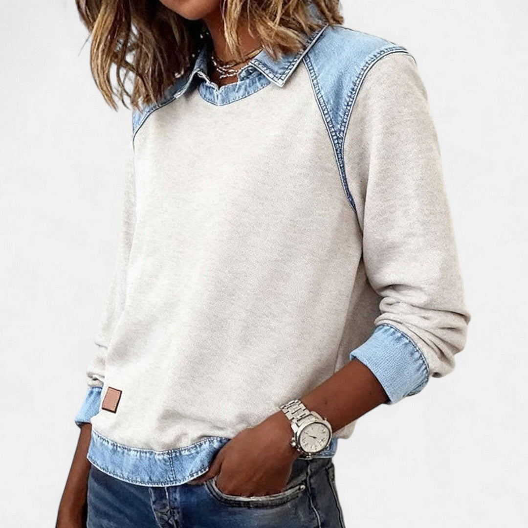 Zailah™ sophisticated sweater from Emma & Rose Cape Town, shown styled as a blouse with a soft, elegant fabric and classic design.