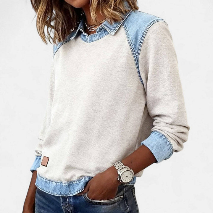 Zailah™ sophisticated sweater from Emma & Rose Cape Town, shown styled as a blouse with a soft, elegant fabric and classic design.