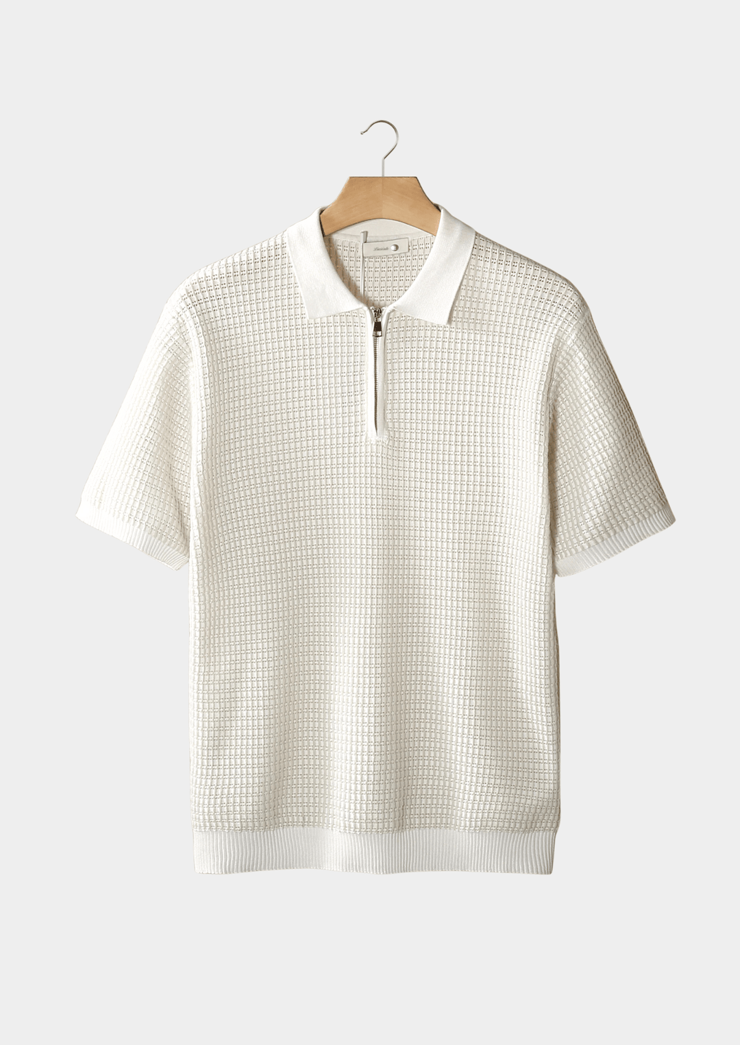 Emma & Rose Manhattan Henk textured zipper polo shirt with a classic collar and zipper detail, shown in a close-up image.