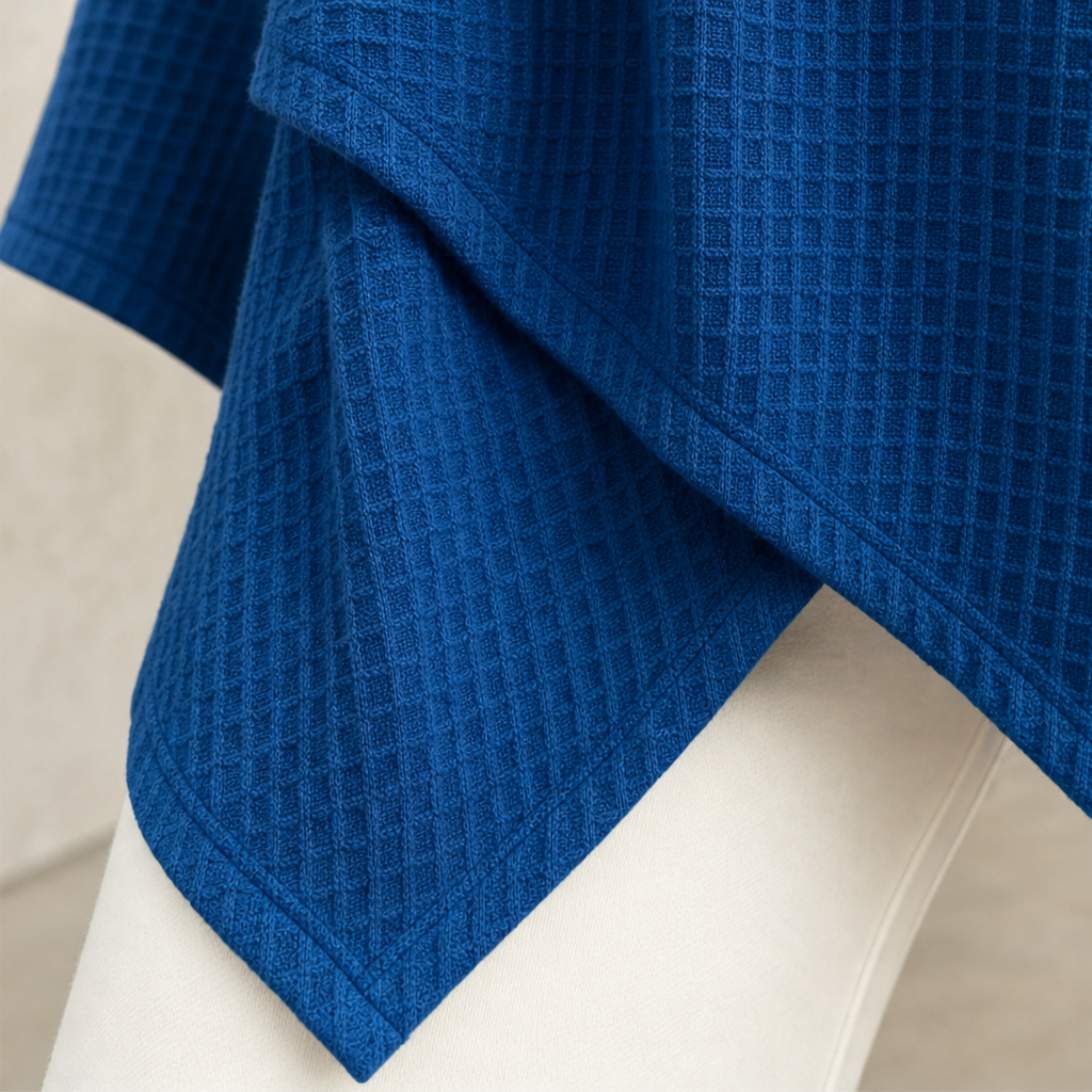 Drapella Asymmetric Crossover Hem Waffle Knit Top - Elena Harper