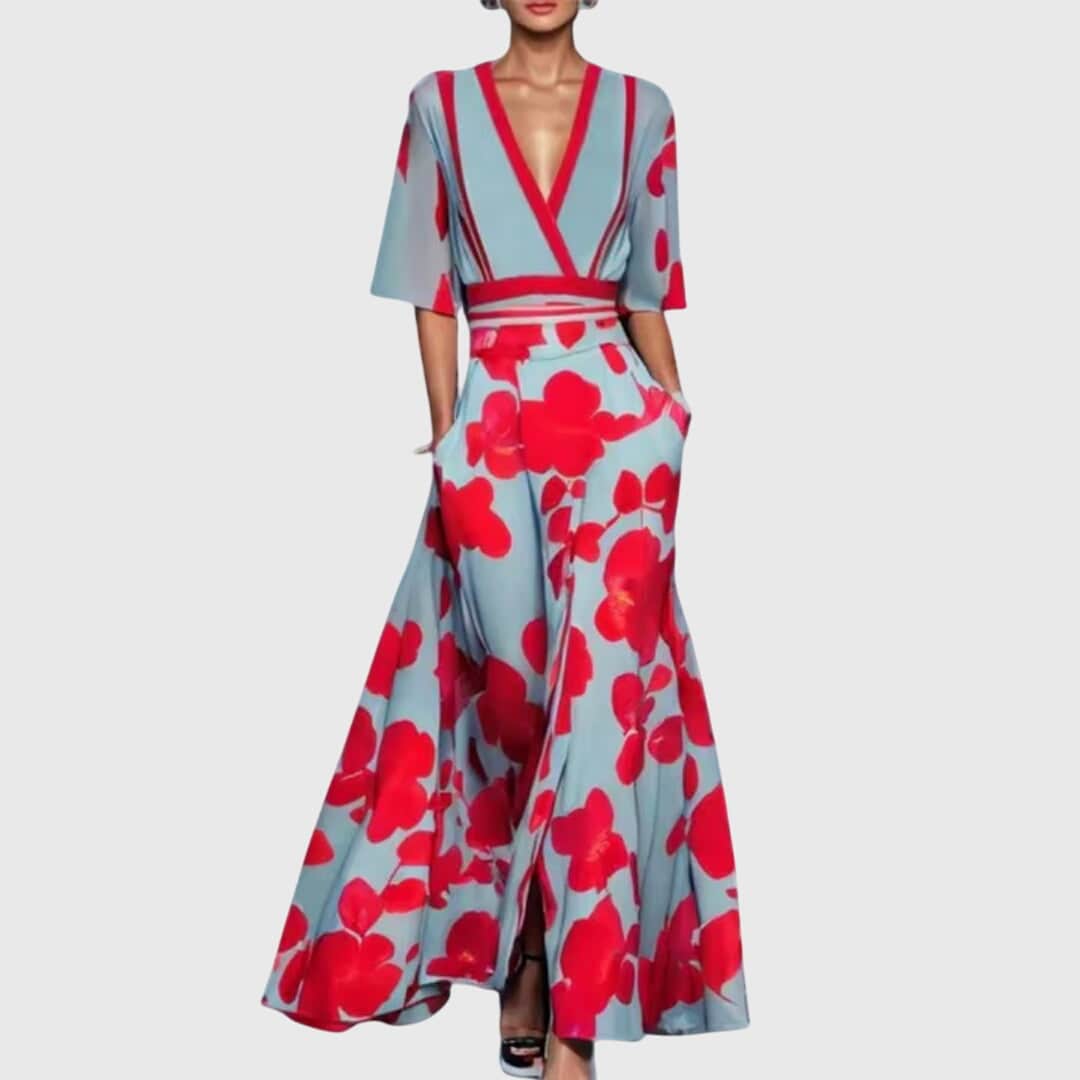 Elegant Candice™ spring dress by Emma & Rose Cape Town, featuring floral print and flowing fabric.
