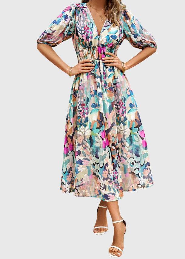 Emma & Rose Cape Town Merlin™ floral midi dress, Estella #1002, featuring a flattering design with vibrant floral pattern.