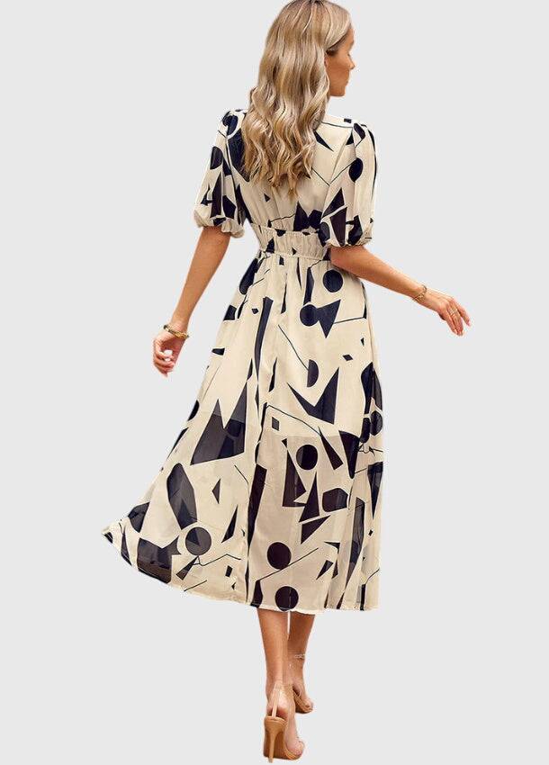 Emma & Rose Cape Town Merlin™ Flattering Floral Midi Dress #1002 Estella with vibrant floral pattern and elegant midi length.