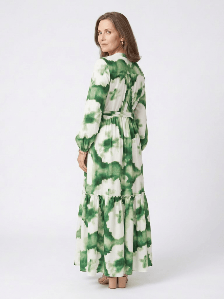 Sabine™ waist-tiered maxi dress by Emma & Rose Cape Town, flowing fabric, sleeveless design, and tiered skirt in a soft, elegant style.