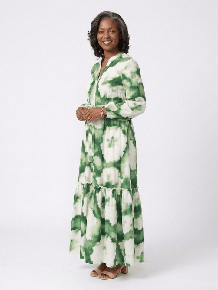 Emma & Rose Cape Town Sabine™ waist tiered maxi dress in flowing fabric, featuring a fitted bodice and layered skirt.