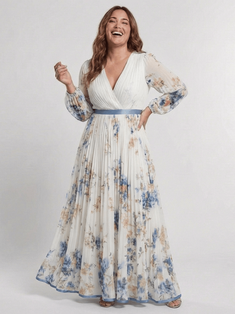 Lavinia™ floral maxi dress by Emma & Rose Cape Town featuring a flowing silhouette and vibrant floral pattern.