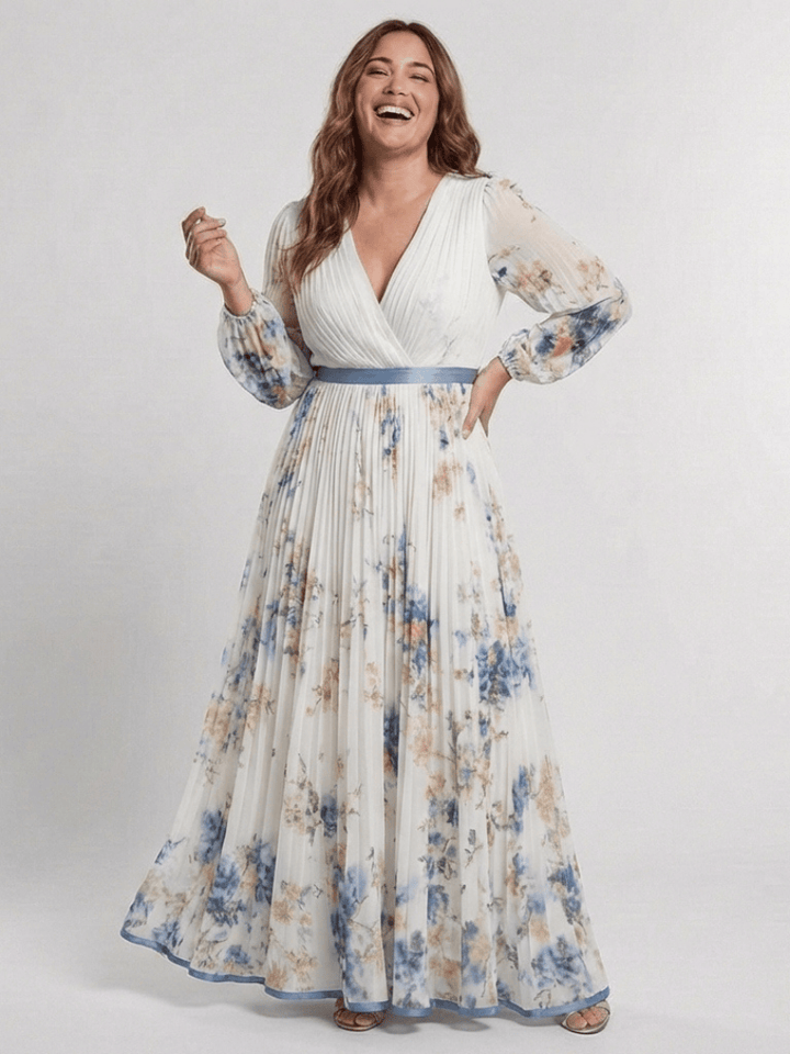 Lavinia™ floral maxi dress by Emma & Rose Cape Town featuring a flowing silhouette and vibrant floral pattern.