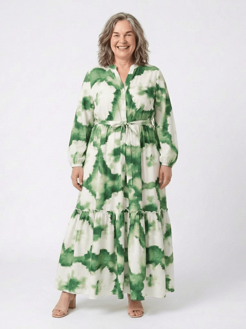 Sabine™ waist tiered maxi dress by Emma & Rose Cape Town, featuring flowing fabric and a fitted waist silhouette.
