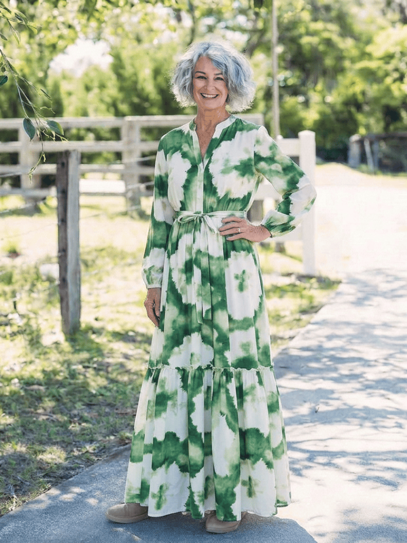 Sabine™ waist tiered maxi dress by Emma & Rose Cape Town, featuring flowing fabric and a tiered design in a full-length style.