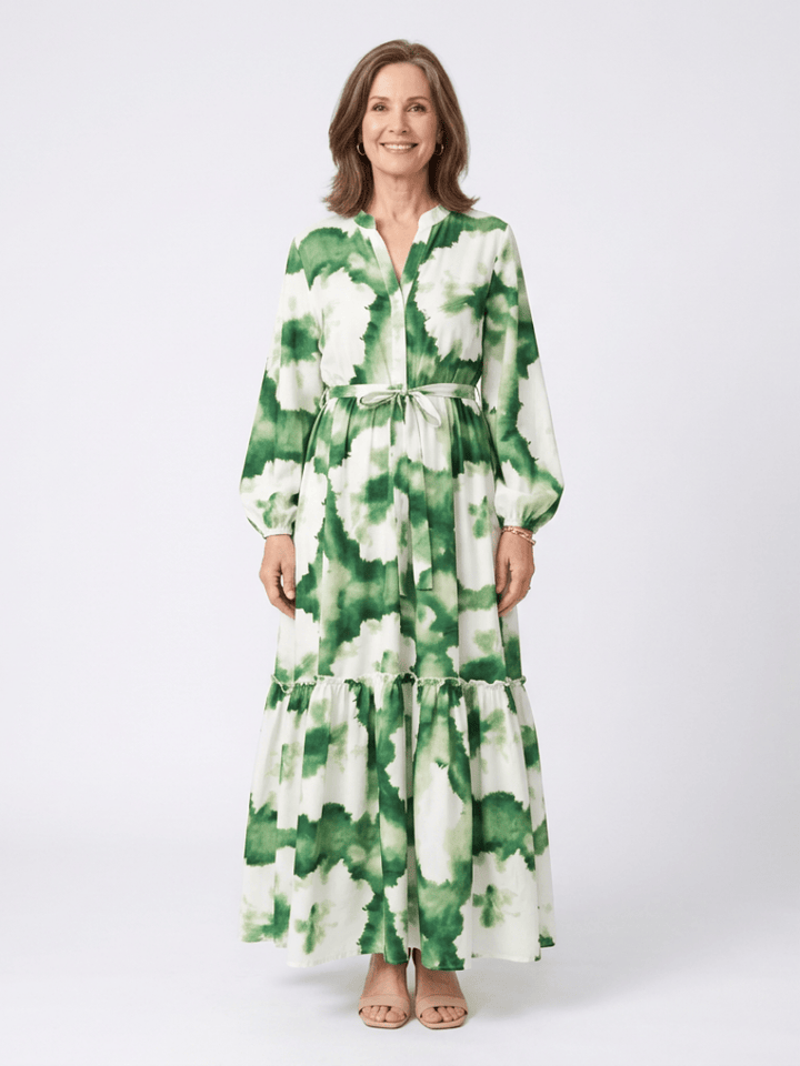 Sabine™ waist tiered maxi dress by Emma & Rose Cape Town, featuring flowing fabric and a tiered design for elegant summer wear.