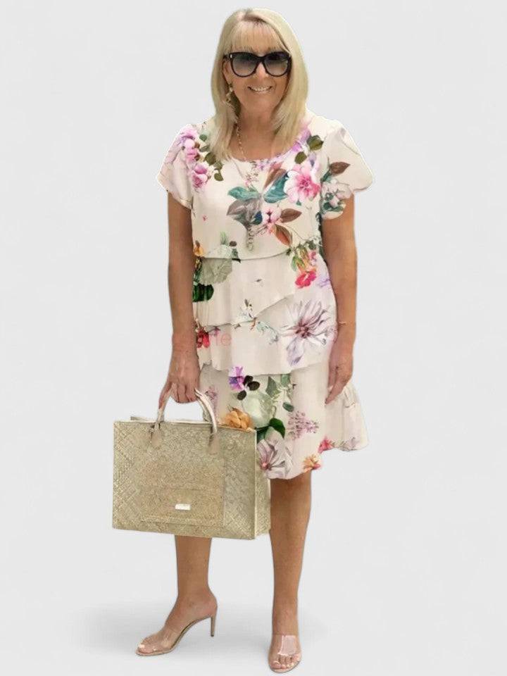 Elegant Angel™ dress by Emma & Rose Cape Town featuring a flowing fabric and stylish design, perfect for special occasions.