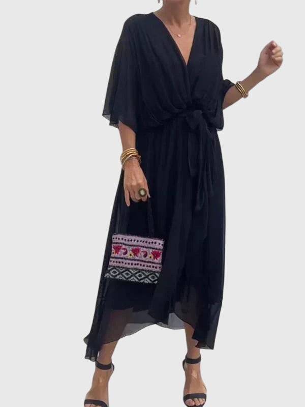 Bethany™ elegant dress by Emma & Rose Cape Town, showcasing a stylish, flowing design with intricate details and a flattering fit.